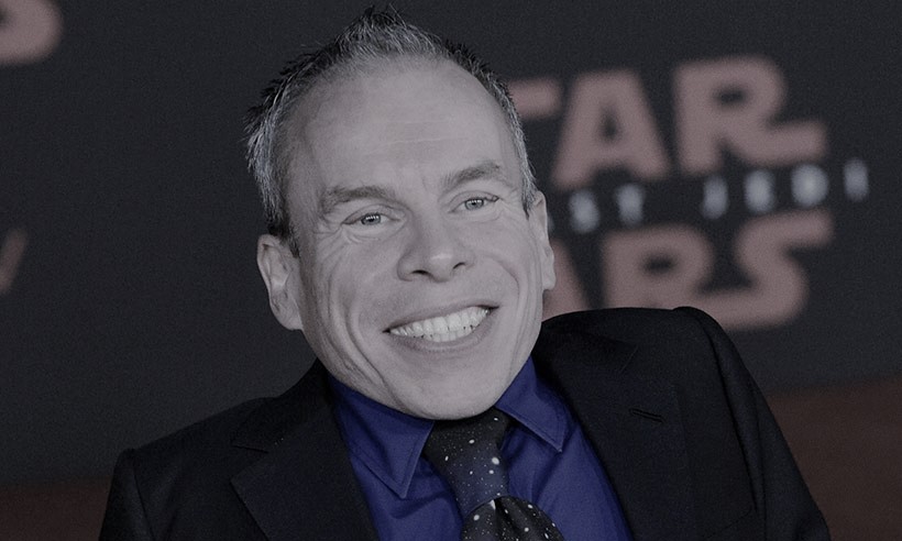 A photo of Warwick Davis smiling